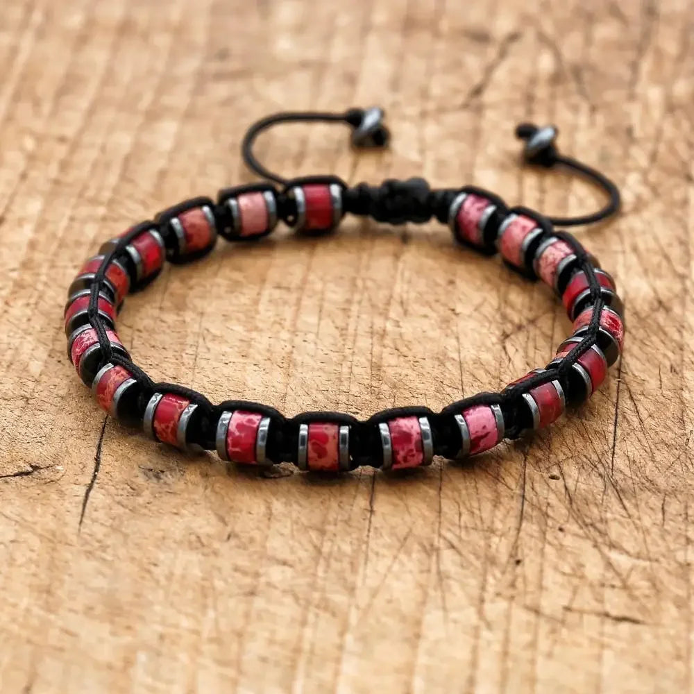 Men's and women's braided bracelet with natural hematite, dragon blood beads, and unakite stones, handmade health jewelry for couples.