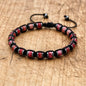 Men's and women's braided bracelet with natural hematite, dragon blood beads, and unakite stones, handmade health jewelry for couples.