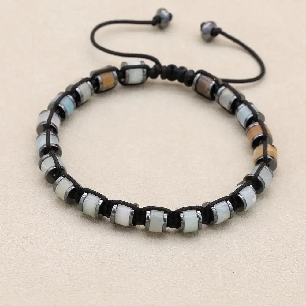 Men's bracelet with natural hematite and dragon blood beads, braided design, handmade jewelry for men and women, health-focused accessory.