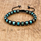 Men's and women's braided bracelet with natural hematite, dragon blood beads, and unakite stones, handmade health jewelry for couples.