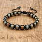 Men's and women's braided bracelet with natural hematite, dragon blood beads, and unakite stones, handmade health jewelry.