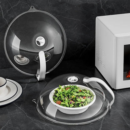 Transparent microwave splash cover with handle, steam vent, and high-temperature resistance for protecting microwave interiors.