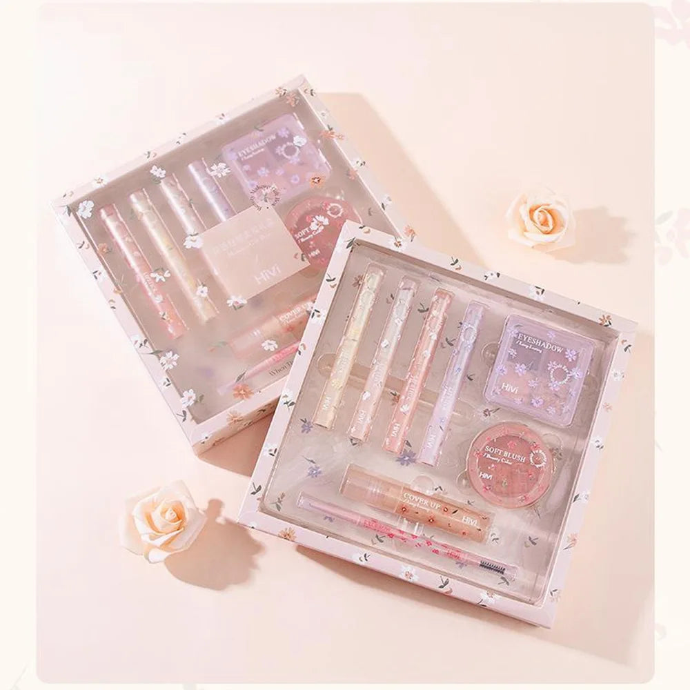 8-piece BackupMyFilesNow.com beauty makeup set with lipstick, concealer, eyeshadow, eyebrow, and blush products arranged together.