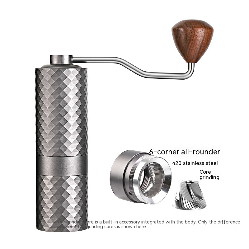 Black manual coffee grinder by BACKUPMYFILESNOW.COM® with a sleek design and textured grip for easy grinding.