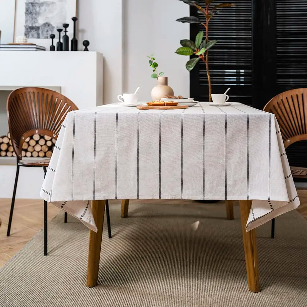 White cotton linen boho farmhouse tablecloth with burlap stripes, washable rectangle table cover for kitchen or picnic use.
