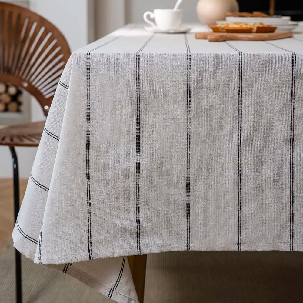 Cotton linen boho farmhouse tablecloth with burlap stripes, washable rectangle table cover for kitchen or picnic use.