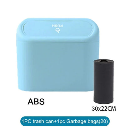 White car trash can with lid, containing garbage bags, leak-proof mini car accessory for small vehicle trash storage.