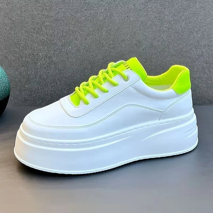 Men's white and green lightweight casual business shoes with thick soles, PU material, suitable for outdoor leisure activities.