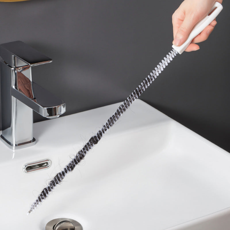 White 45cm pipe drain hair cleaner brush by BACKUPMYFILESNOW.COM® for removing hair clogs from pipes.