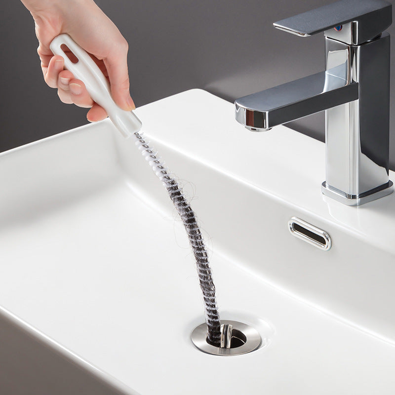 White 45cm Pipe Drain Hair Cleaner Brush by BACKUPMYFILESNOW.COM® for removing hair clogs from drains.