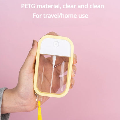 White 50ml vegan scented hand sanitizer spray with keychain, travel dispenser, alcohol water formula, compact and portable.