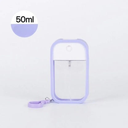 White 50ml vegan hand sanitizer spray with keychain, scented alcohol water dispenser for travel and personal use.
