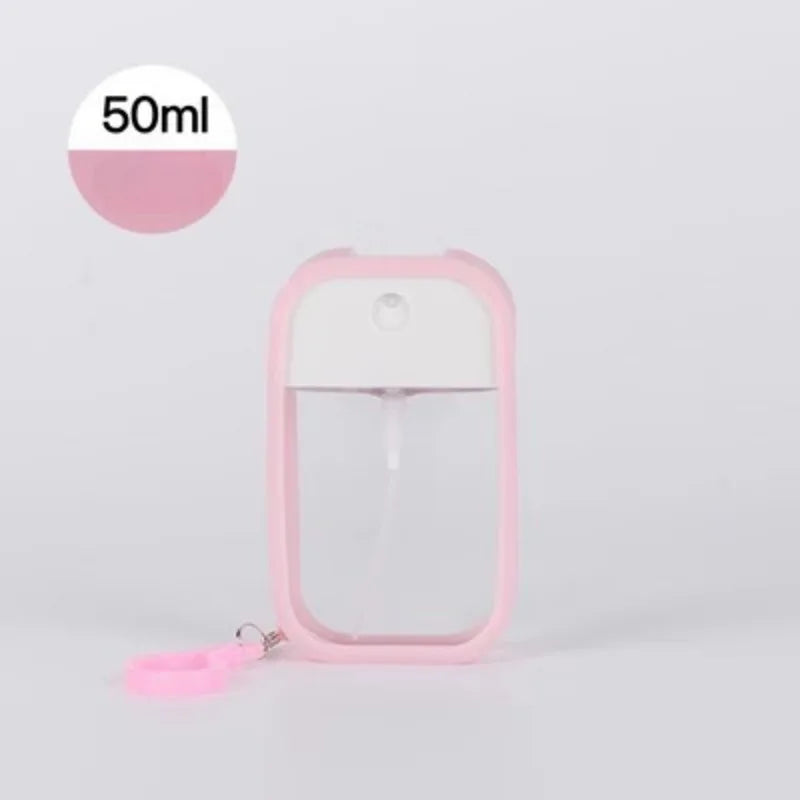 White 50ml vegan scented hand sanitizer spray with keychain, travel dispenser, alcohol-based, compact water spray bottle.