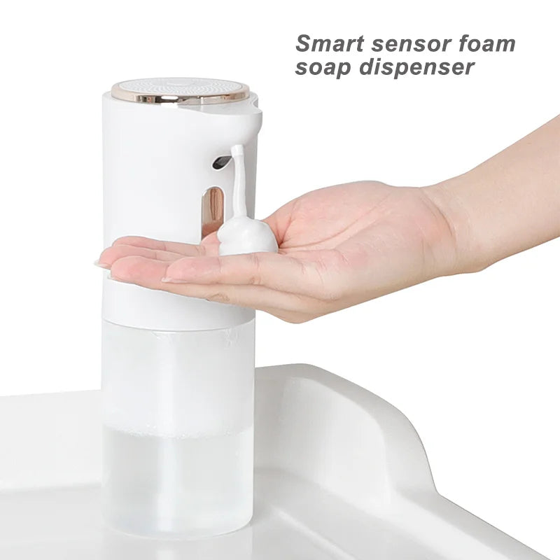 Wall-mounted white Automatic S10 Smart Induction Foam Handwashing Machine with touch-free operation and USB charging in bathroom.