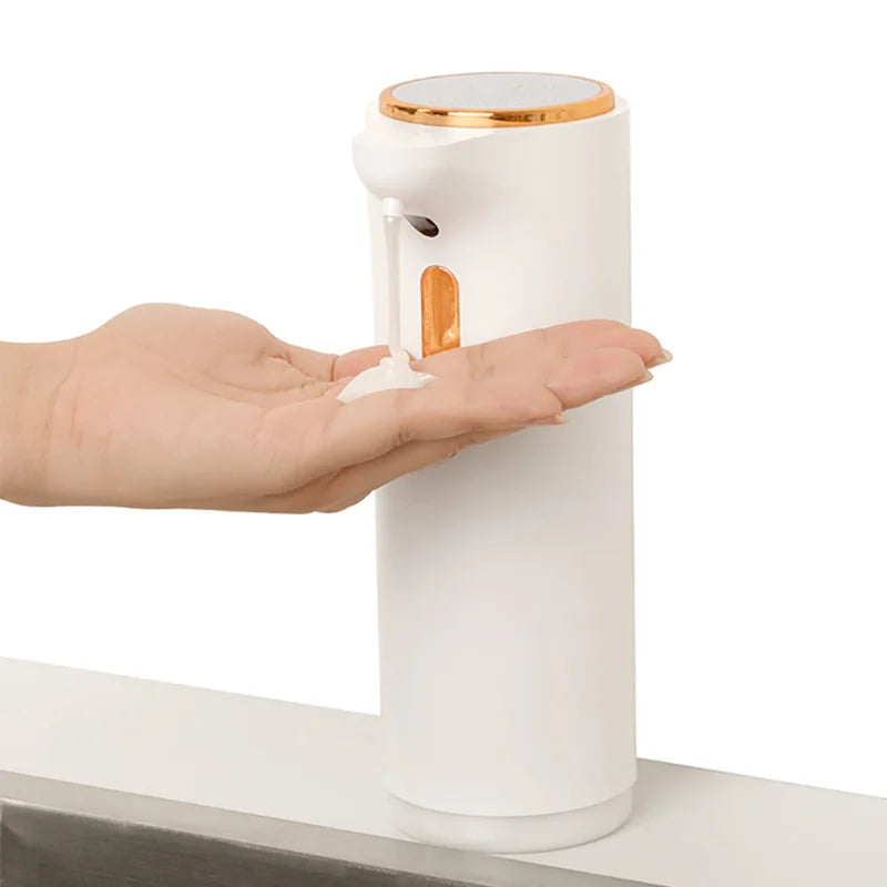 White factory-new hotel touchless soap and shampoo dispenser made of ABS for bathroom use, featuring automatic liquid soap dispensing.