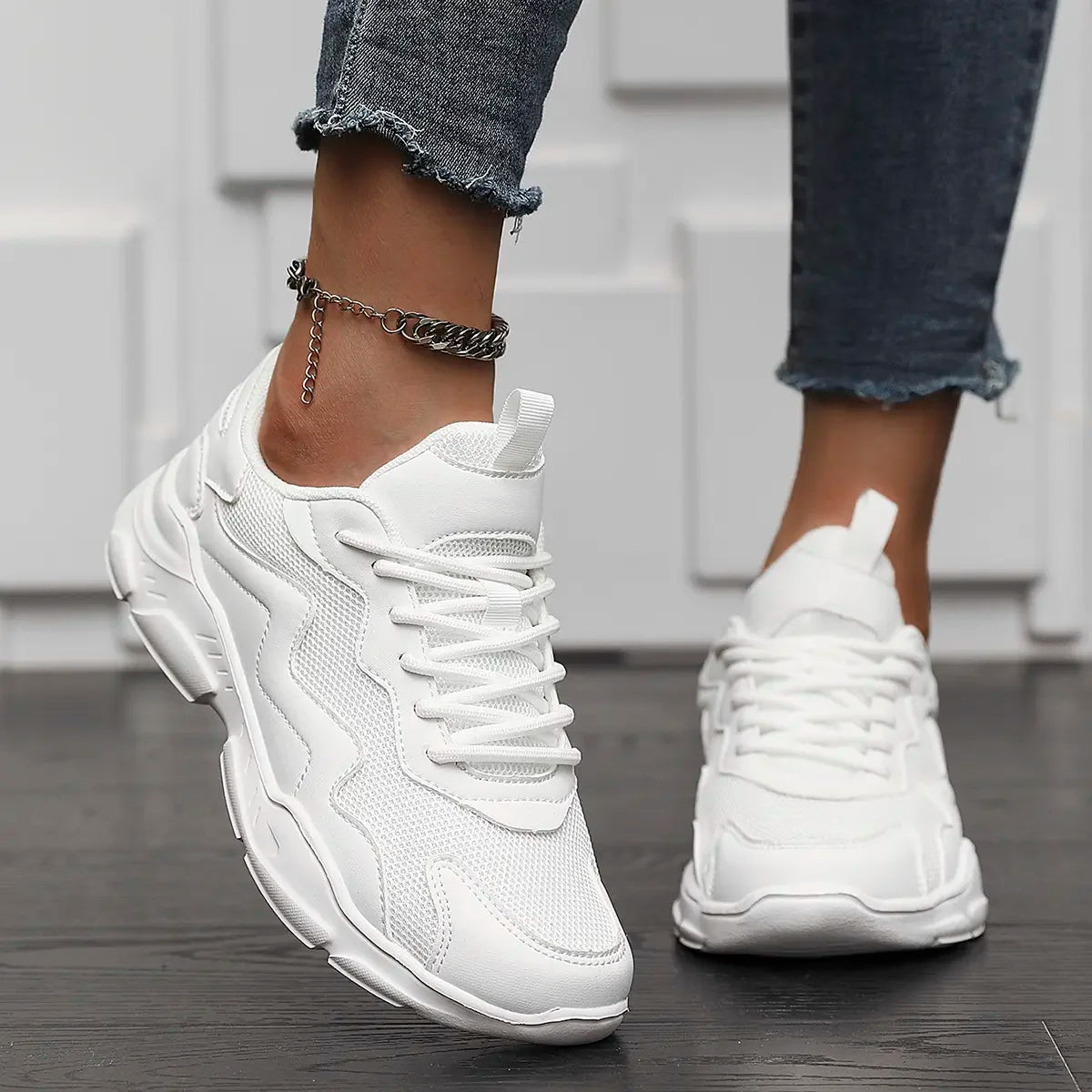 Lightweight black mesh sneakers for women and men, versatile breathable casual shoes from BackupMyFilesNow.com.