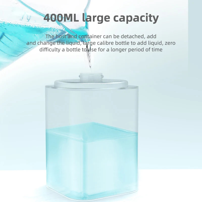 White automatic inductive soap dispenser for foam washing, hand hygiene, and alcohol spray, suitable for phones and smart handwashing.
