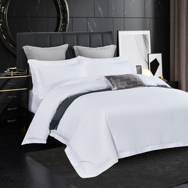 White bedding set for 5-star hotels with duvet cover, sheets, and pillowcases in queen and king sizes, premium hotel-style bed linen.