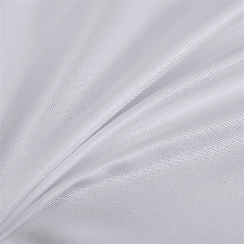 White bedding set with duvet cover, sheets, and pillowcases for double, queen, or king size beds, designed for luxury hotel comfort.