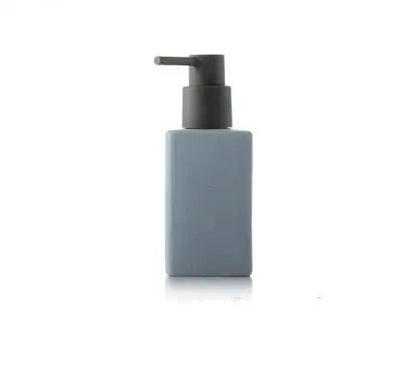 White ceramic bathroom supplies hand sanitizer and lotion bottles with square design, press-top soap liquid container, bathroom accessories.