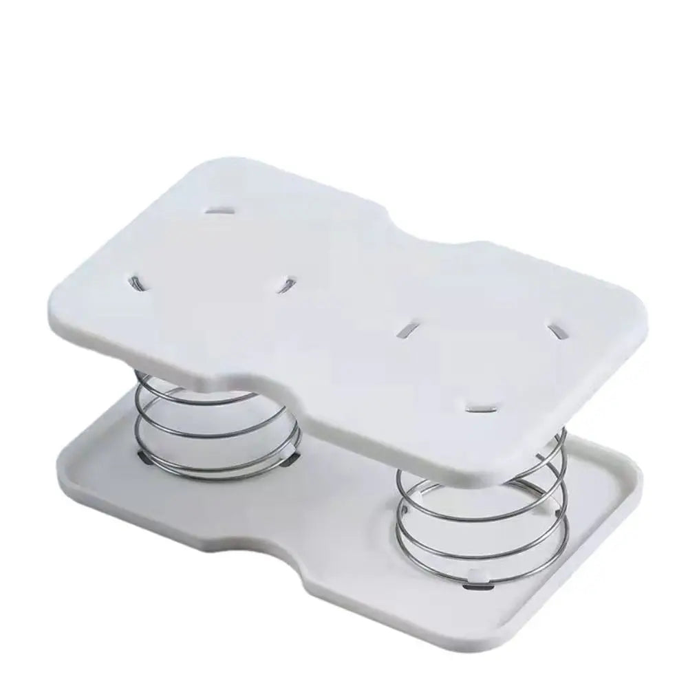 White plastic paper towel spring pallet with high elasticity, designed for tissue boxes, featuring double springs for durability.
