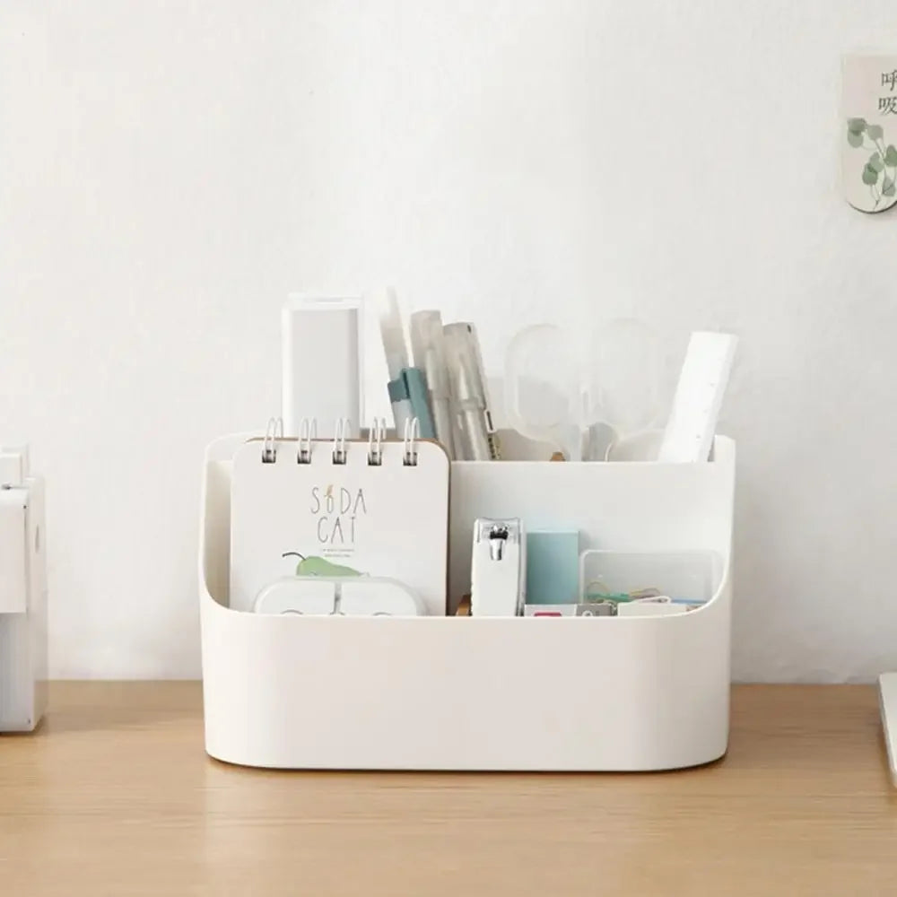 White plastic desk storage box for office supplies, makeup, and cosmetics, with divided compartments for organizing desktop essentials.