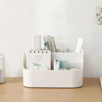 White plastic desk storage box for office supplies, makeup, and cosmetics, with divided compartments for organizing desktop essentials.