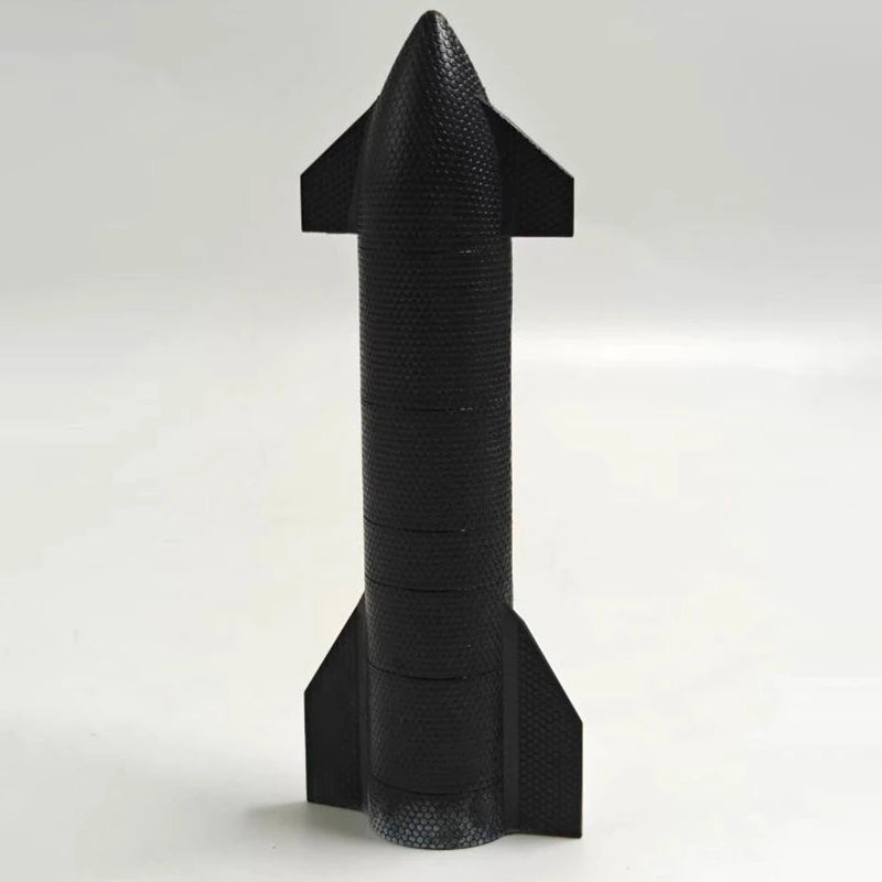White diecast 1:400 scale SpaceX Starship model by BACKUPMYFILESNOW® for display, showcasing detailed alloy space exploration spacecraft.