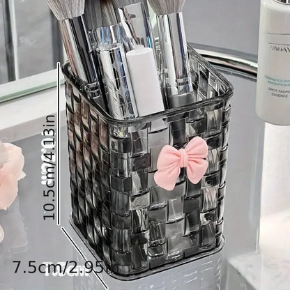 Clear acrylic desk organizer with bow accent, PMMA pen holder, and storage basket for office supplies and accessories.