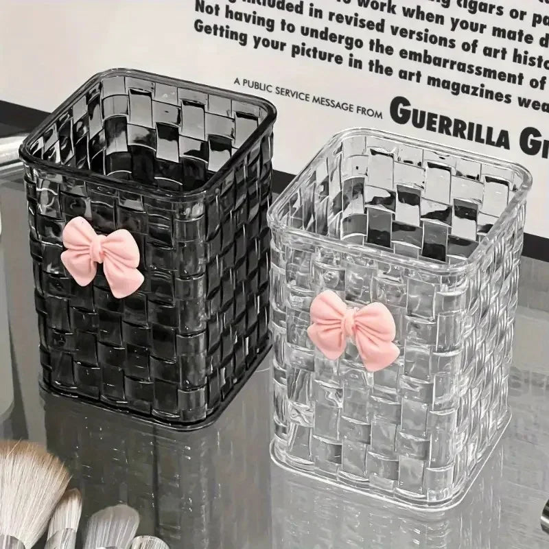 Clear acrylic desk organizer with bow accent, PMMA pen holder, and storage basket for office supplies and accessories.