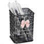 Clear acrylic desk organizer with bow accent, pen holder, and storage basket for office supplies and accessories.