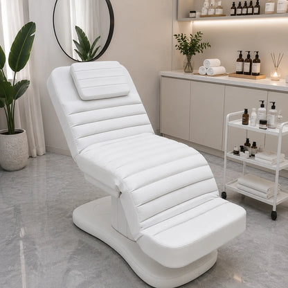 Electric beauty bed with white PU leather, ergonomic design, easy-to-clean surface, ideal for salons and spa massage treatments.