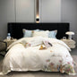 Luxury white bedding set with embroidered flowers, Egyptian cotton duvet cover, fitted sheet, mattress cover, and pillowcases.