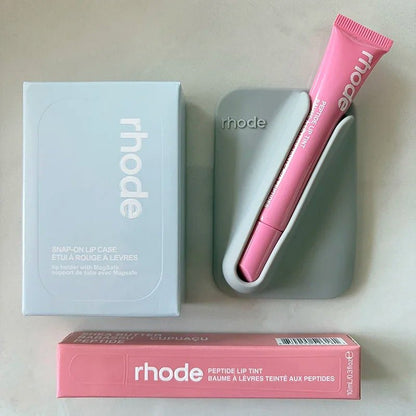 Fashion brand cosmetics lip gloss in six colors, displayed on a portable magnetic mounting bracket with patterned ribbon design.