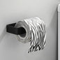 White kitchen paper towel holder and adhesive tissue hanger with toilet roll dispenser and cabinet storage for bathroom accessories.