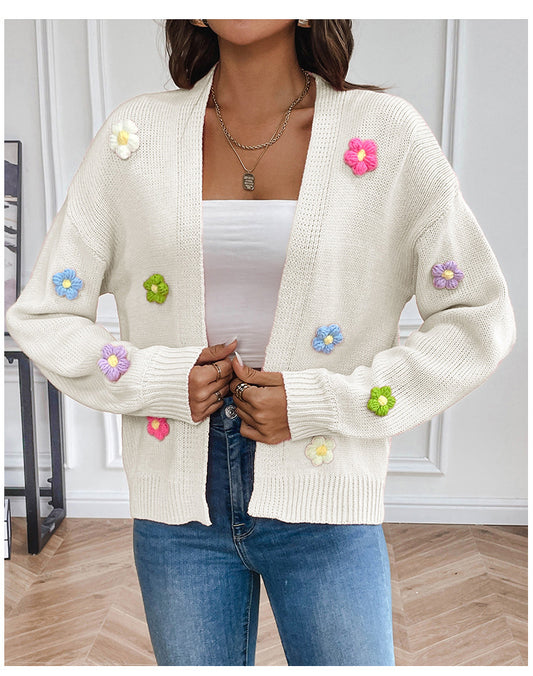 White knitted women's cardigan with floral design, cozy sweater coat from BackupMyFilesNow.com