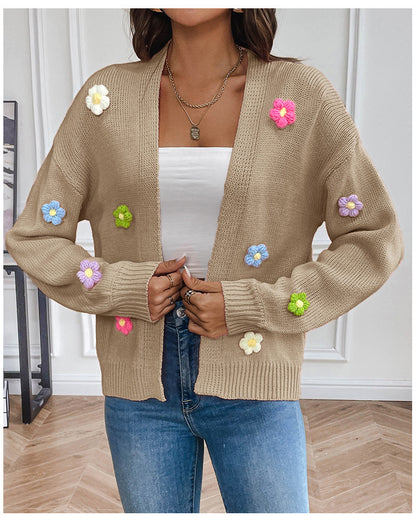 White knitted cardigan for women with floral design, soft sweater coat by BackupMyFilesNow.com.