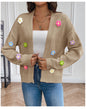White knitted cardigan for women with floral design, soft sweater coat by BackupMyFilesNow.com.