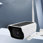 Wireless solar-powered security camera by BackupMyFilesNow.com showing white weatherproof design and compact low-power camera unit.