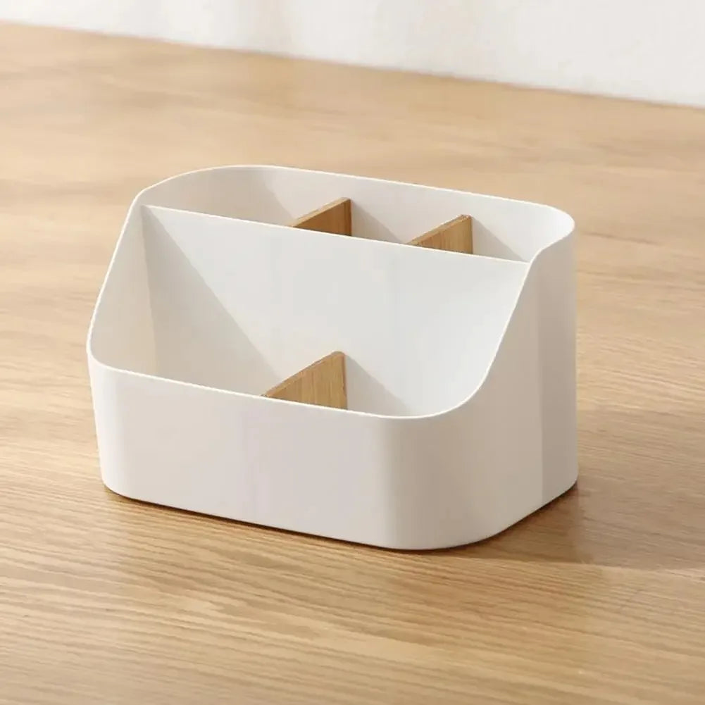 White office supplies storage box with compartments for organizing cosmetics and office essentials in living and work spaces.