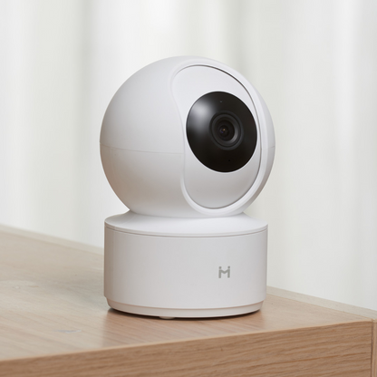 White BackupMyFilesNow.com smart security camera with adjustable mount and lens for home surveillance and security.