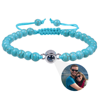 White turquoise custom photo projection bracelet by BackupMyFilesNow.com featuring engraved text in 100 languages.