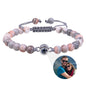 White turquoise custom photo projection bracelet by BackupMyFilesNow.com featuring engravings in 100 languages.
