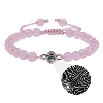 White turquoise custom photo projection bracelet by BackupMyFilesNow.com featuring engraved text in 100 languages.