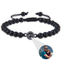 White turquoise custom photo projection bracelet from BackupMyFilesNow.com featuring engraved text in 100 languages.
