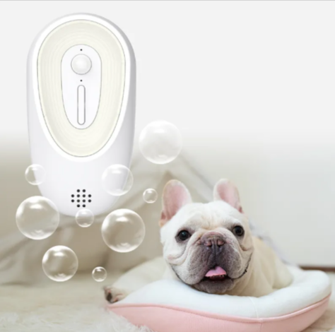 White USB pet odor eliminator for litter boxes by BackupMyFilesNow.com, compact device to reduce pet odors effectively.