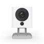Wireless smart home security camera system in white by BackupMyFilesNow.com, featuring multiple cameras and sleek design for home security.