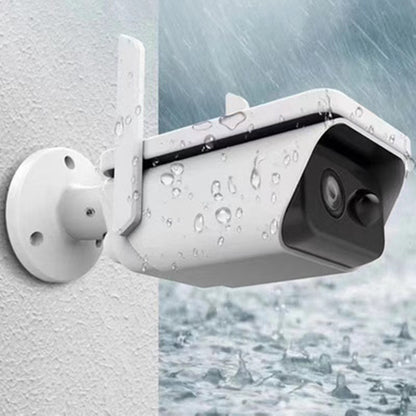 White 3MP FHD solar outdoor security camera with night vision and two batteries for reliable surveillance.