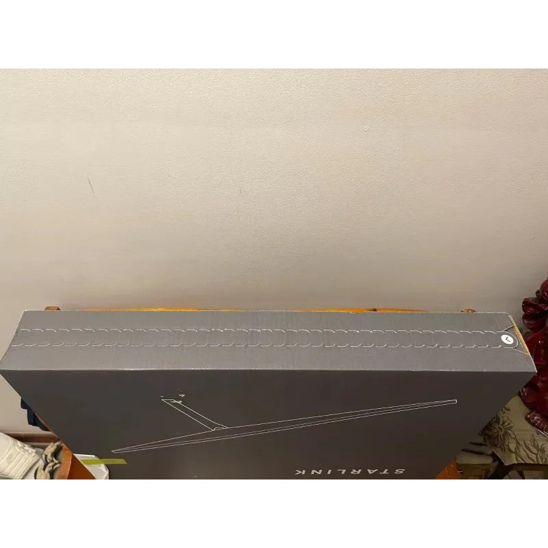 White Starlink Internet Kit with fourth-generation mini satellite antenna and phased array technology, portable and for worldwide use.