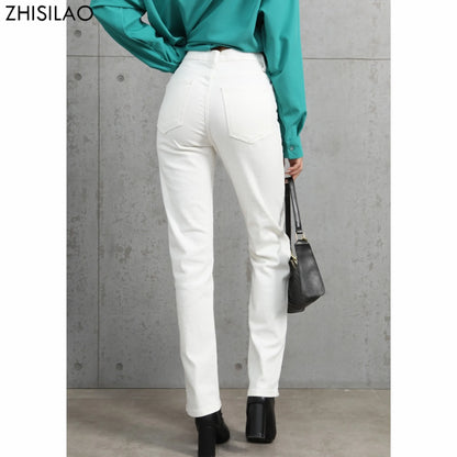 White vintage women’s high-waist, straight-leg denim jeans with stretch, wide-leg style, perfect for autumn streetwear fashion.